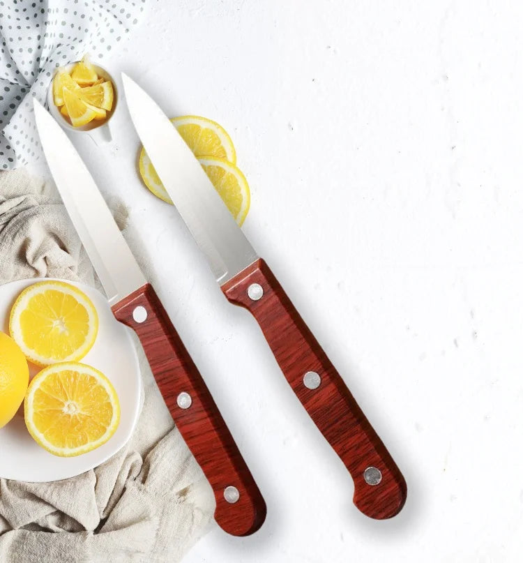 A Popular Stainless Steel Fruit Knife For Kitchen Straight Knives A Small Kitchen Accessory And A Wooden Hand-held Fruit Knife